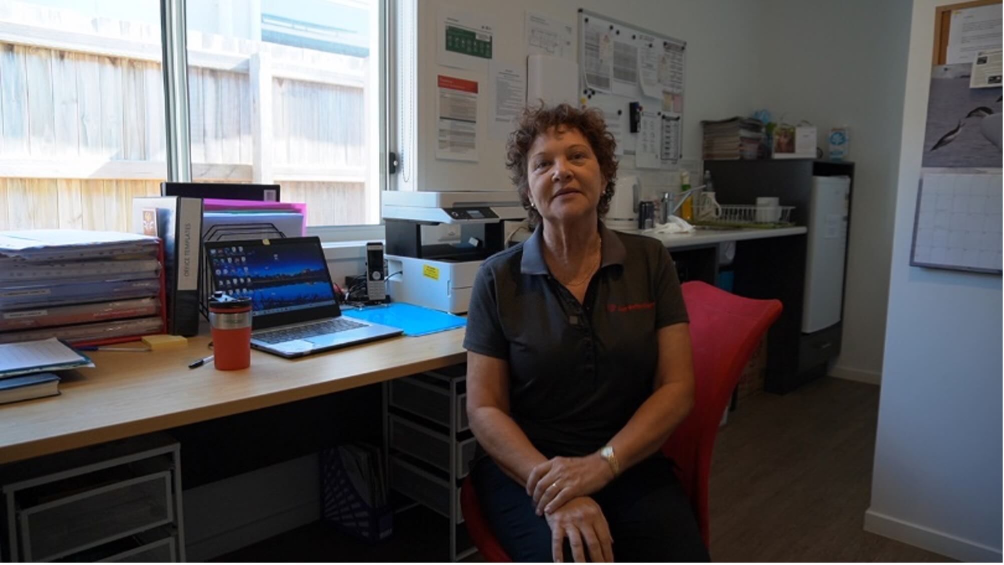 Kathy at her desk